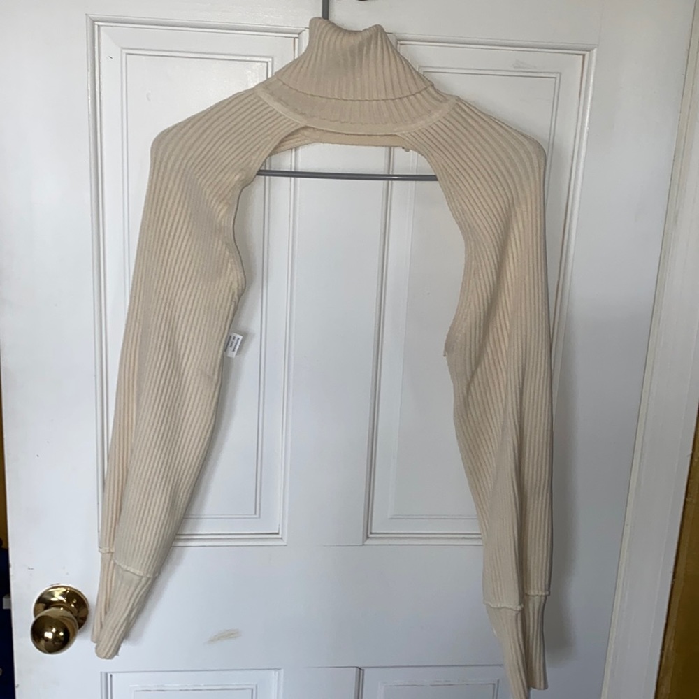 Beige turtleneck shrug with sleeves